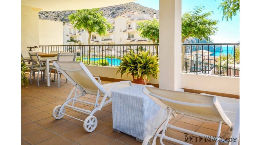 This two-bedroom apartment with lovely sea views and a..