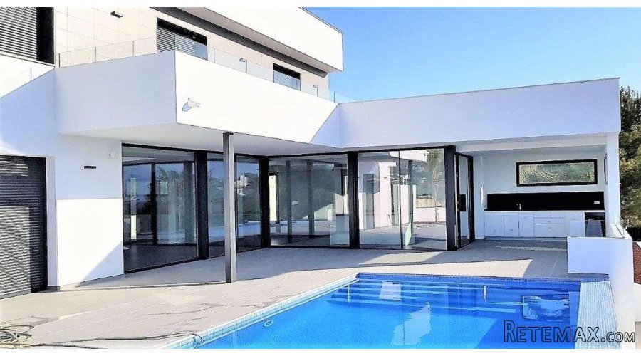 Recently finished modern villa on an elevated plot with..