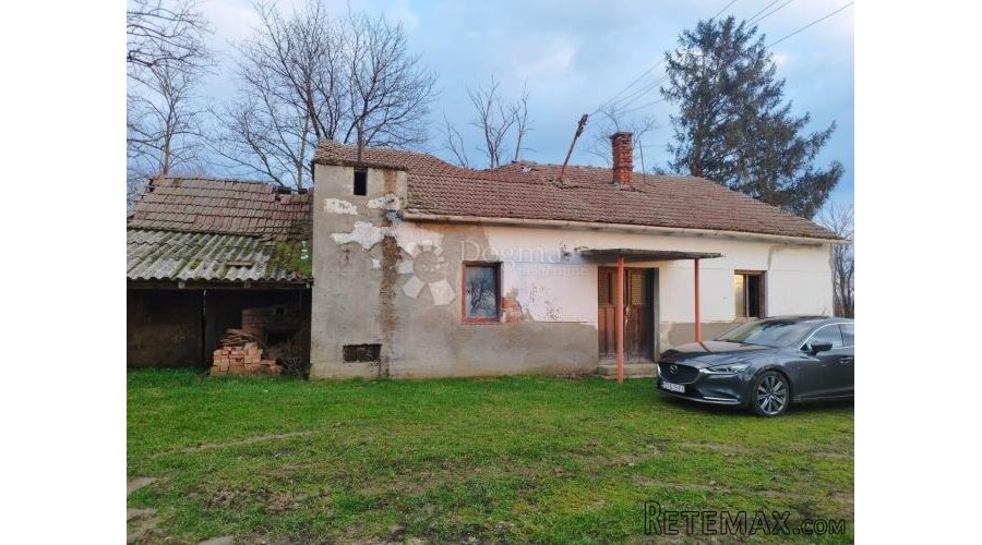 KUTJEVO - ODLIČNO POLJOPRIVREDNO ZEMLJIŠTE S DVIJE KUĆE