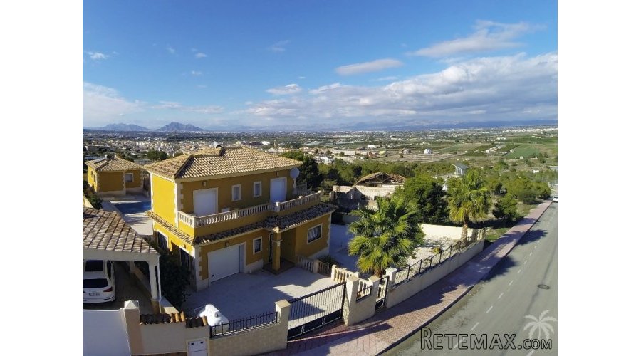 Detached luxury villa on a corner plot with private pool..