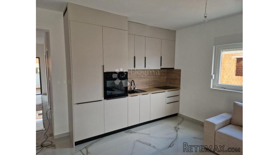 Dvoetažni apartman u novogradnji u Palitu.