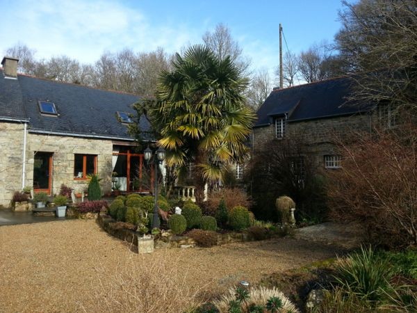 Watermill in River Setting With Stables