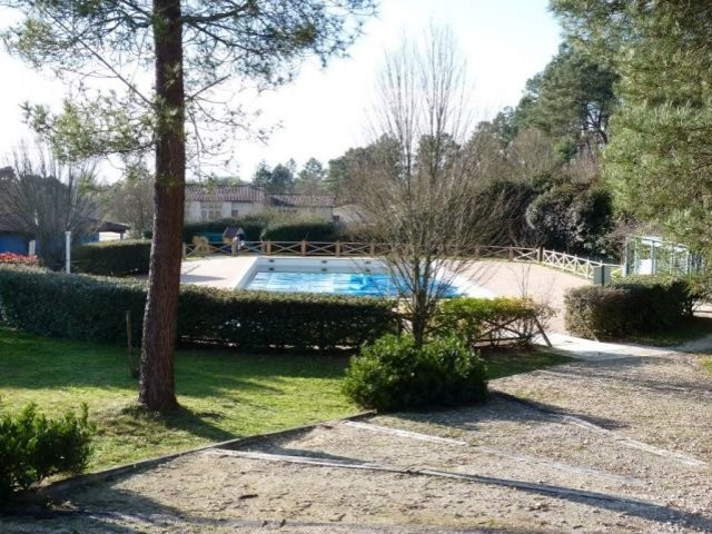 Lakeside plot of land with building..
