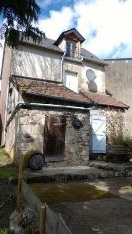 In BOUSSAC, with garden up to the river..