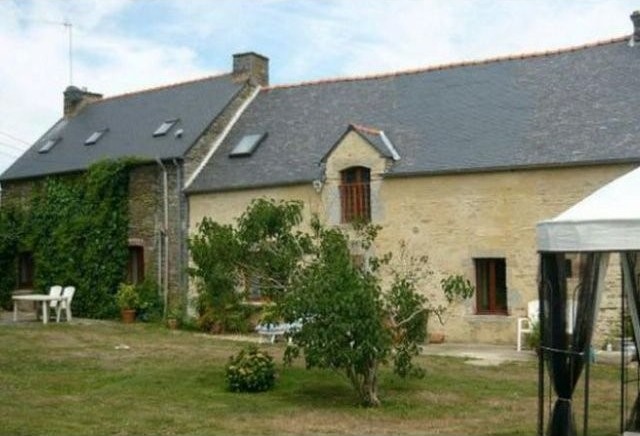 Farmhouse with Lake and Outbuilding