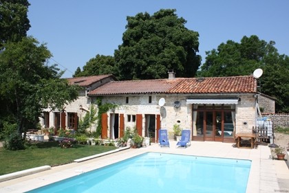 Spacious stone property with pool close..