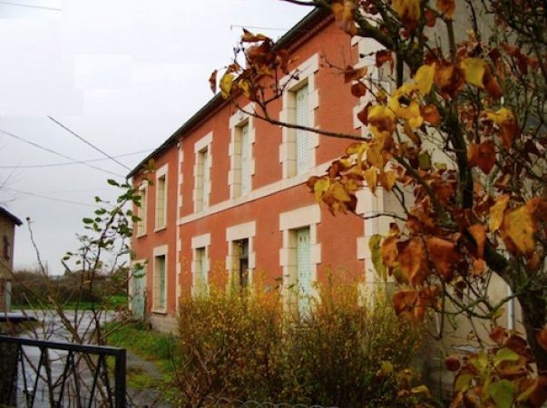 Large House With Many Outbuildings