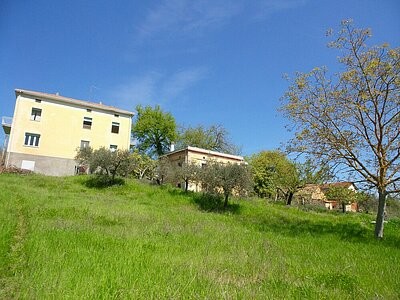 2 detahced properties with an..