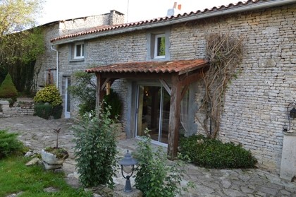 Pretty stone property with pool and gîte