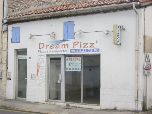 Building with shopl and apartment in..