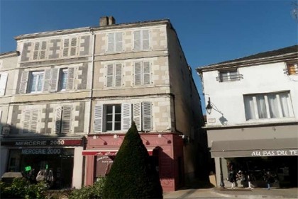 Town centre property with shop and two..