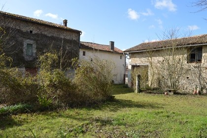 Town property with large outbuildings..