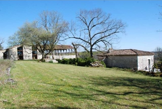 Stylish Ensemble Of 2 Lot Stone Houses..