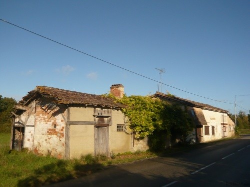 2 bed house with large amount of land..