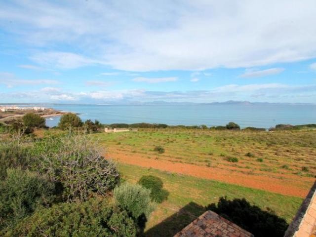 Seafront plot with construction project