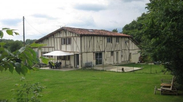 Half-Timbered House In The Countryside..