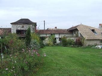 Group Of Two Charming Stone Houses..