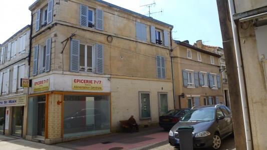 SHOP AND 3 APARTMENTS WITH GOOD INCOME..