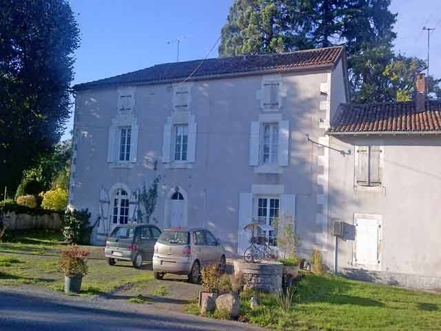 Village House With A Barn In The..
