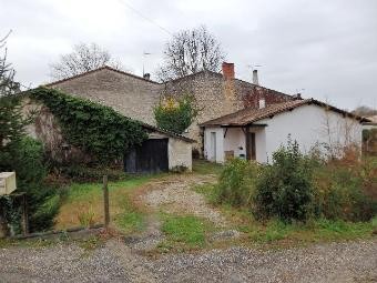 A Small Stone House Situated In An.. - 2