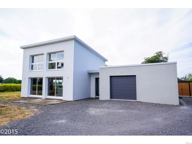 New House Set Near A Village With Shops