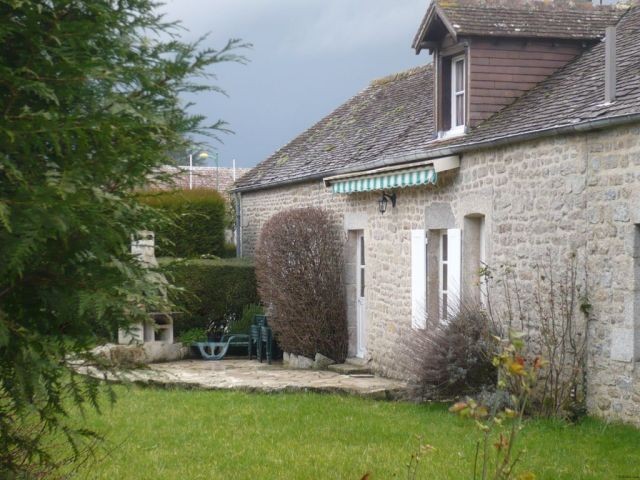 Stone Farmhouse Set in a Rural Town