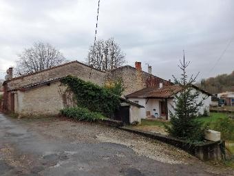 A Small Stone House Situated In An..