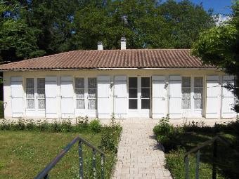 This Lovely Bungalow In Need Of Some..