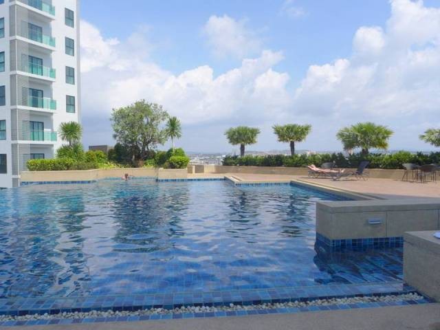 New 2-bedroom sea view condo at top..