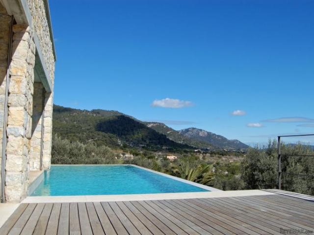Modern stone facade country house with..