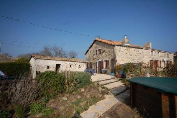 St Marc La Lande. Pretty stone house..