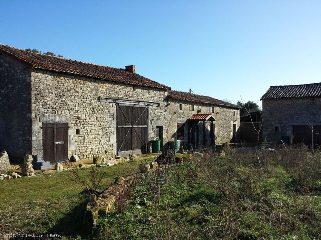 Renovated stone house with attached..