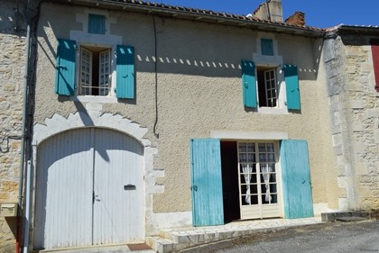 Three-bed village property with garden..