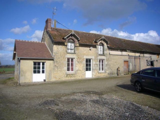 Farmhouse with Outbuildings over More..