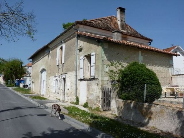 Village house with barn
