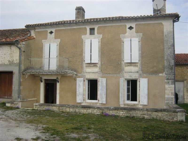 Farm : 2 houses & outbuildings set on..