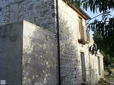 Semi detached stone cottage outside 2..