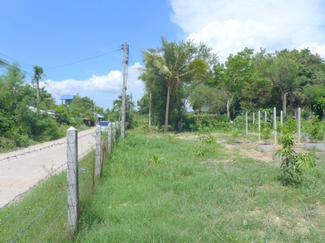 Nearly 1 Rai building plot next to a..