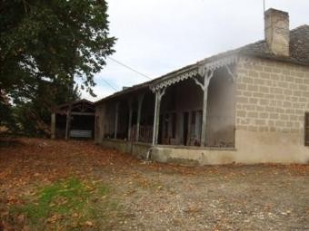 A Large Stone Farmhouse In Need Of..