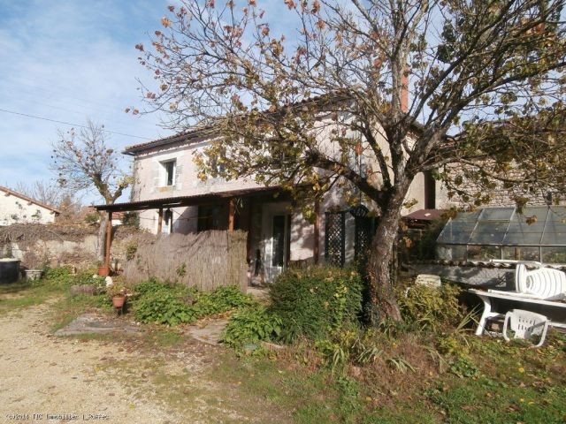 Spacious stone house with attached land