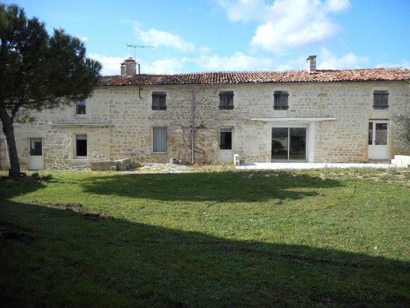 Two Stone Houses With Outbuildings
