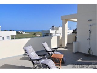This modern penthouse ( with solarium ), is located in one..