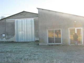 Large agricultural building with office..
