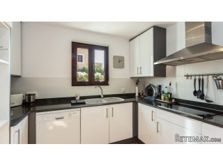 Spacious ground-floor apartment with garden is located in..