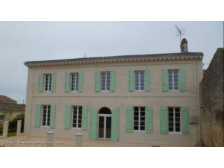 Restored stone house near fishing port..