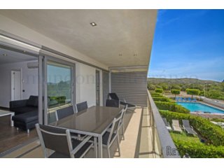 Contemporary apartment in a modern building with large..