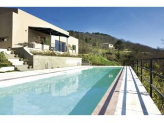 Modern Villa On A Hillside Overlooking..