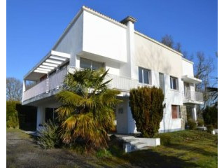 Art-deco style house in small hamlet..