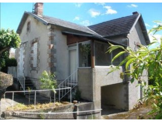 Interesting house on edge of town -..