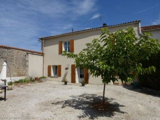 Pretty village with garage and enclosed..